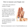 Instructions on how to measure bangle size with a hand and measuring tape.