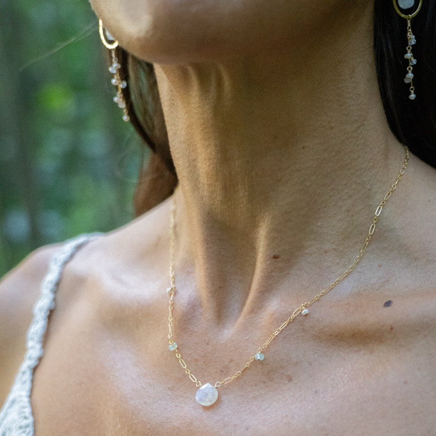 The Naupaka Necklace worn layered at the throat