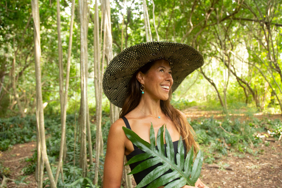 Noelani, the founder, at work in her Hawaii studio