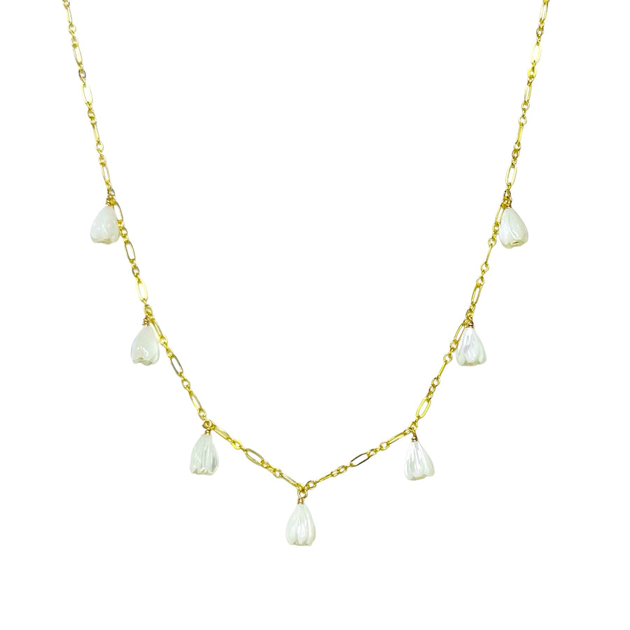 The Mōhalu Necklace on a plain ground, a single mother of pearl blossom pendant