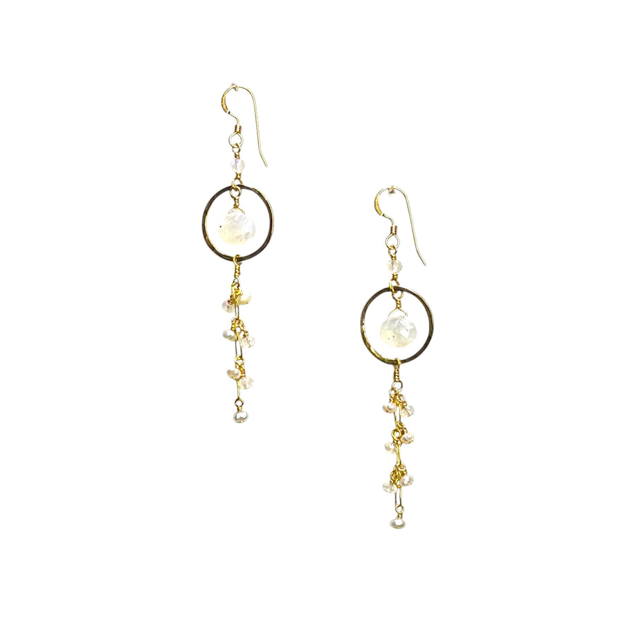 The Hina Earrings on a plain ground, moonstone and pearl drops on gold-fill hoops