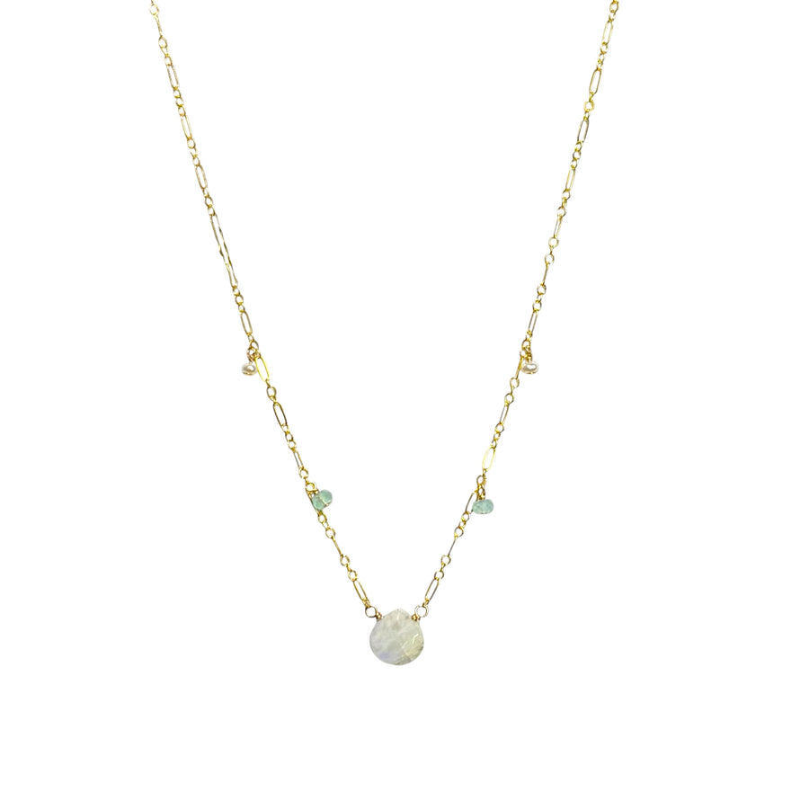 The Naupaka Necklace on a plain ground, moonstone, pearl and chalcedony on a fine chain